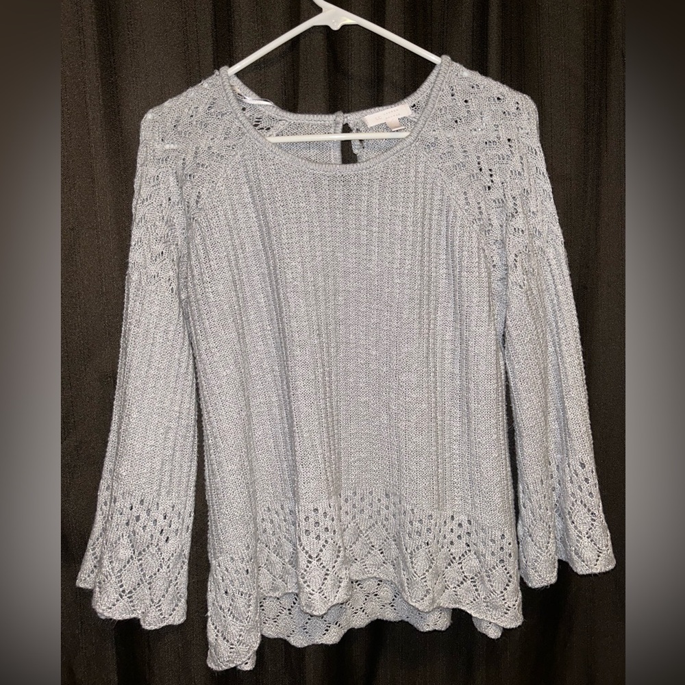 Grey sweater with flared sleeves